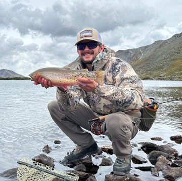 Braden holding a cutthroat trout.