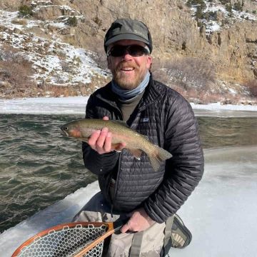 Greg Felt holding a trout