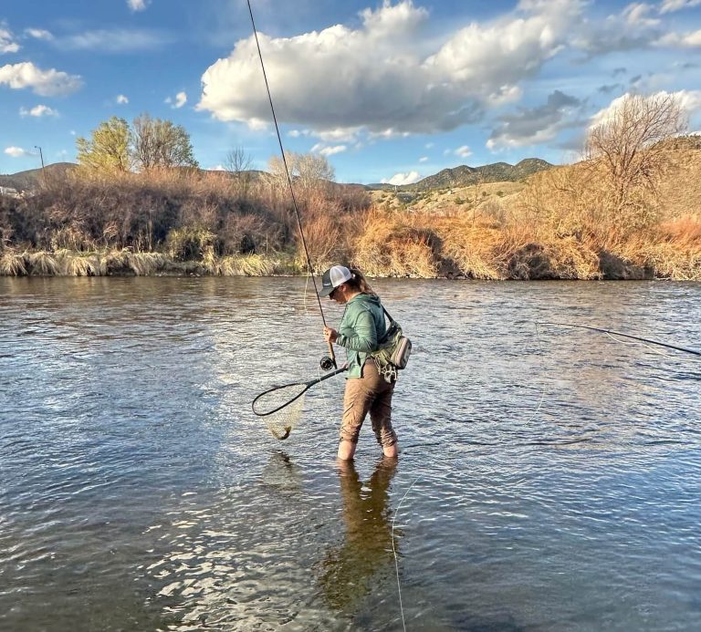 ArkAngler wading the waters in the Arkansas River